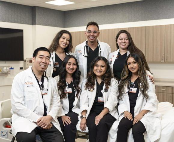 nursing students in white coats